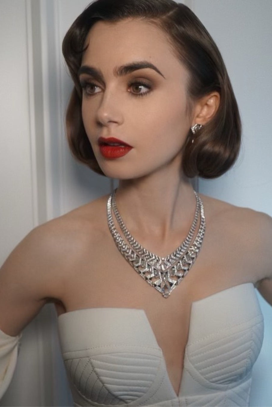 Lily Collins wearing Secret cluster lashes at The Met Gala 2023