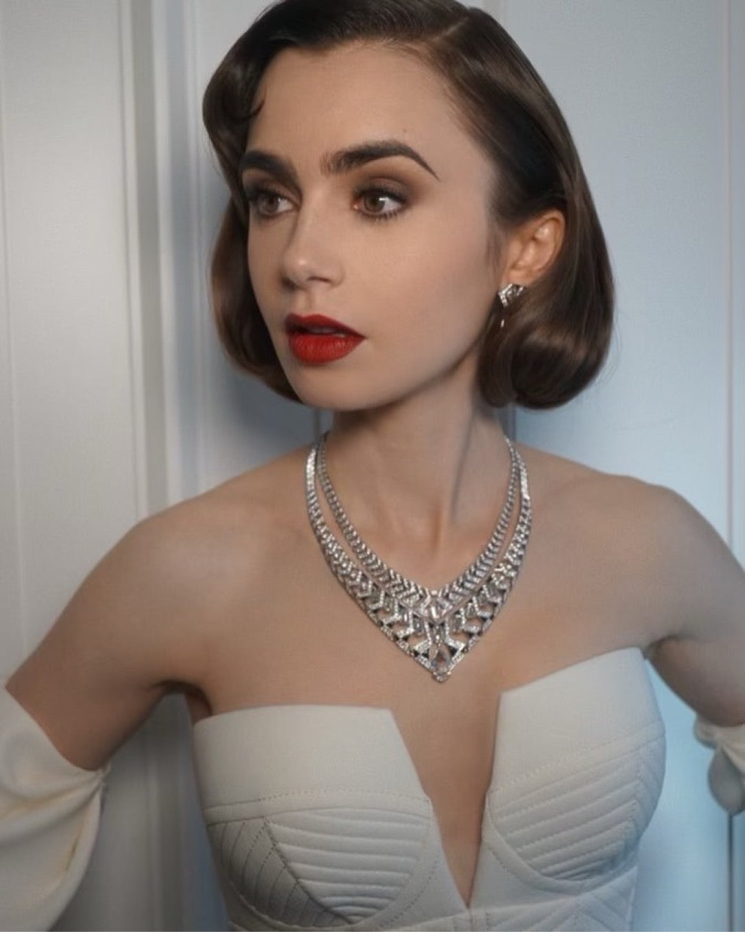 Lily Collins wearing Secret cluster lashes at The Met Gala 2023